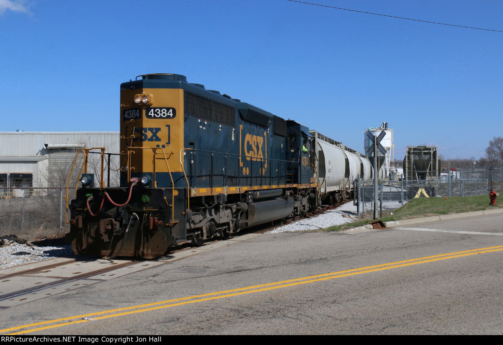 Tied on to the first  cut of outbound cars, L301 prepares to head back to the mainline